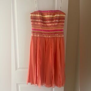 Beautiful beaded coral cocktail dress. By Shelli Segal